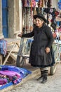 Unidentified indigenous native Quechua woman with traditional tribal clothing and hat, at the Tarabuco Sunday Market, Bolivia Royalty Free Stock Photo